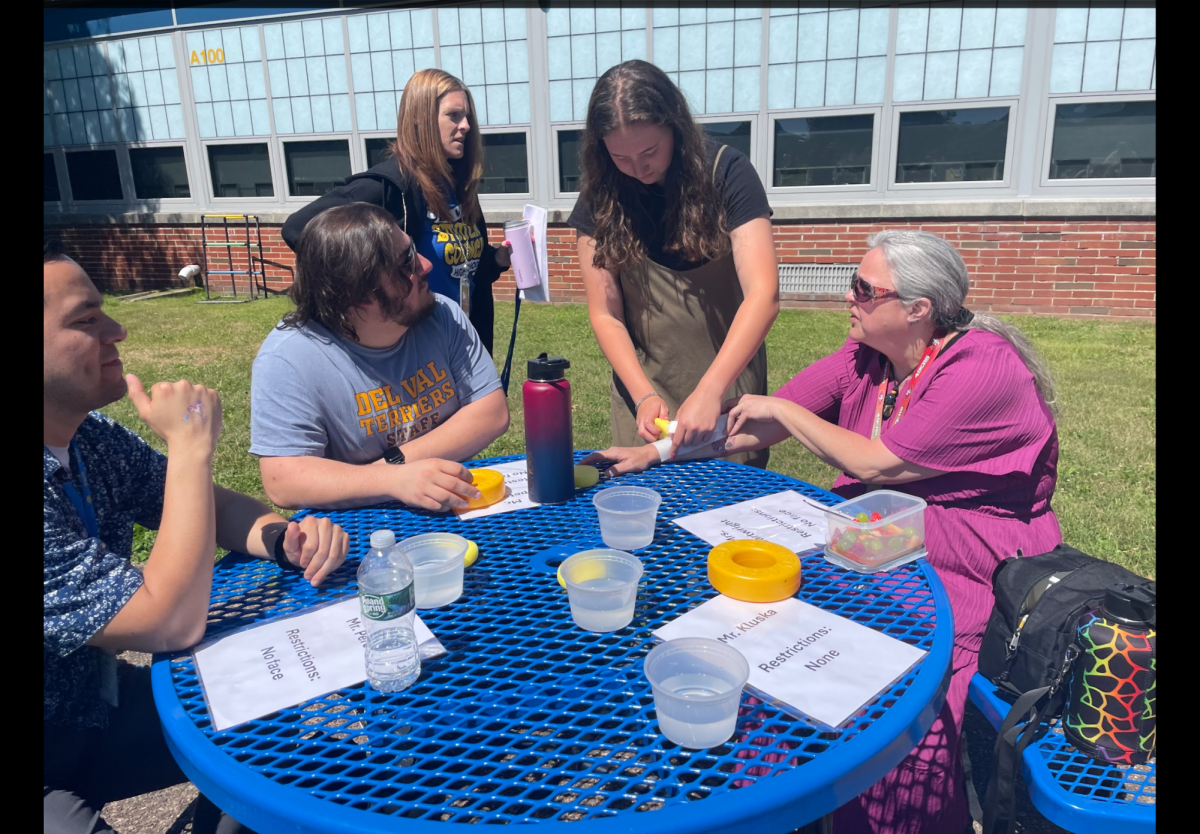 Senior Gwen Taffera tattoos yes her Lisa Cartwright during the event, “Tattoo a Teacher”. The event was a successful fundraiser toward Del Val.
