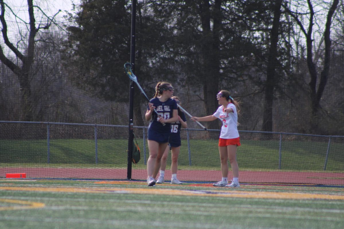 Simpson going to pass to the lacrosse ball during the 2026 season.
