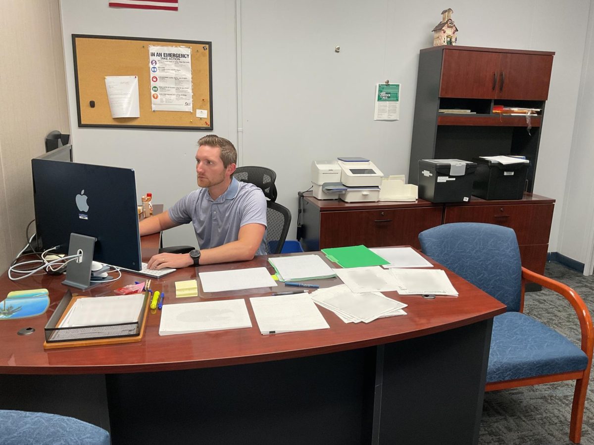 David Garrison, assistant business administrator, working in his office. Garrison joined the Del Val administration this school year. 