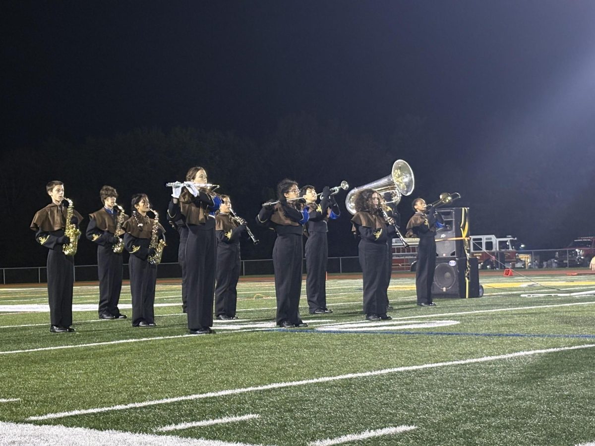 The Golden Regiment Marching Band performs for the half time show. Their show retells the story of Robin Hood named, "Marian the Ladyhood of Sherwood Forest."