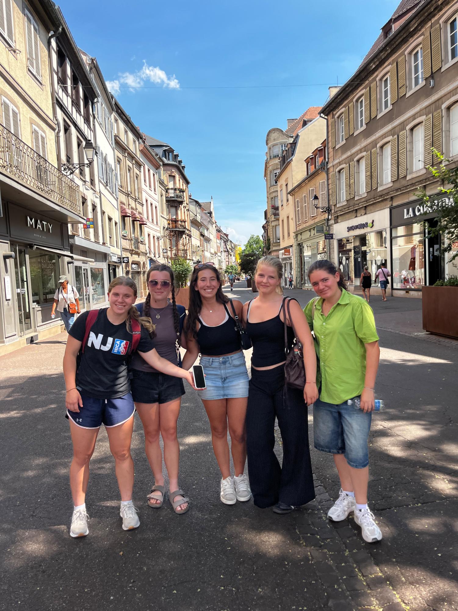 Close friends in the exchange coming together for a photo as they walk the streets of Colmar, France. (Photo via Sarah Ruppert) 