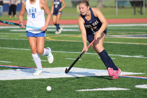 The field hockey team played offense most of the game. That lets them score a lot of goals in the process.