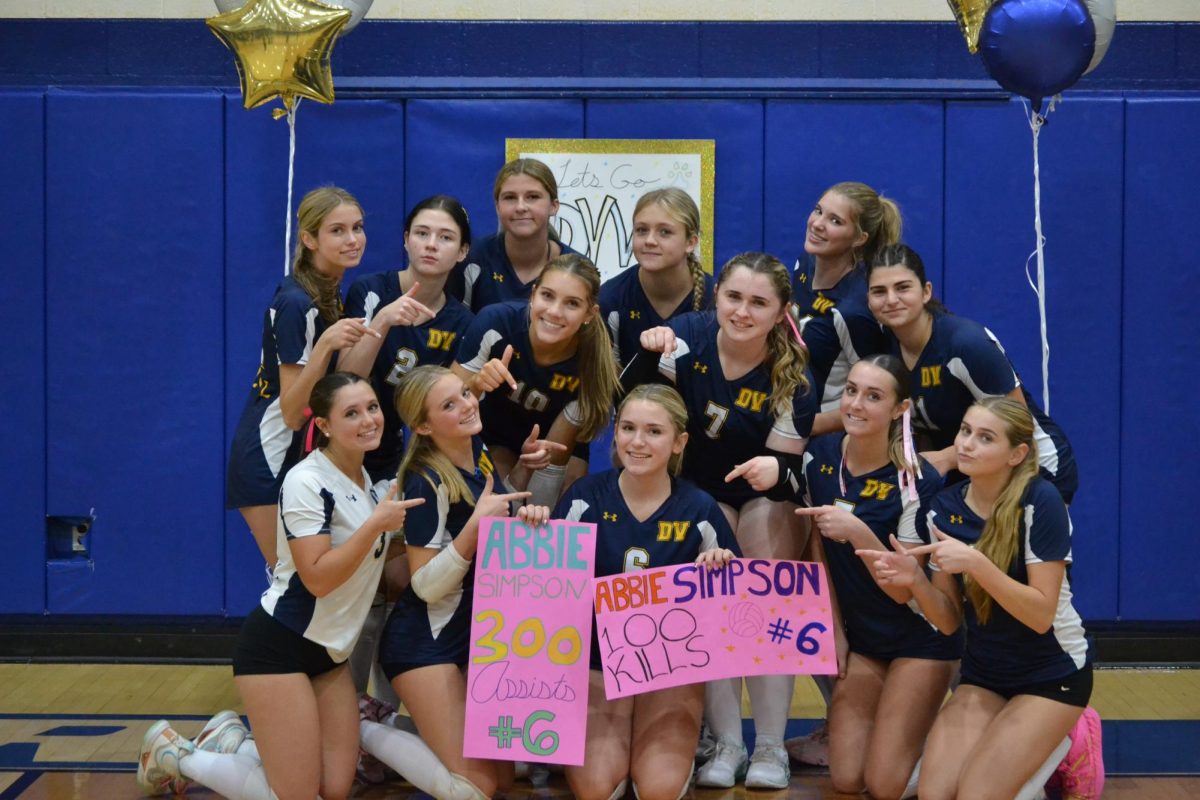 Senior Abigail Simpson achieves 100 kills and 300 assists. Simpson has been playing volleyball for eight years and is co-captain.